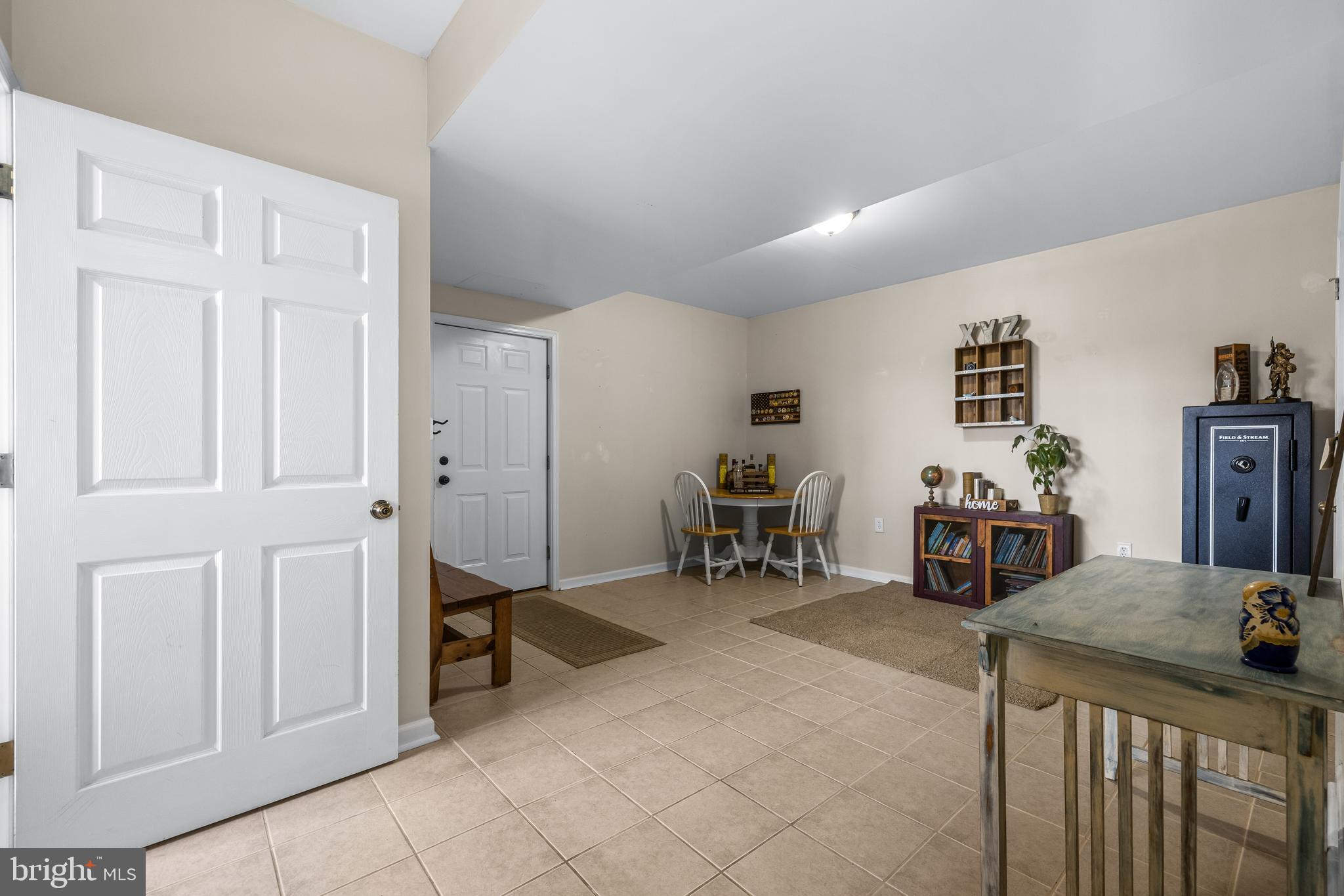 12270 High Point Road Felton, PA 17322 - Photo 25 of 45 a view of a workspace with furniture and a livingroom