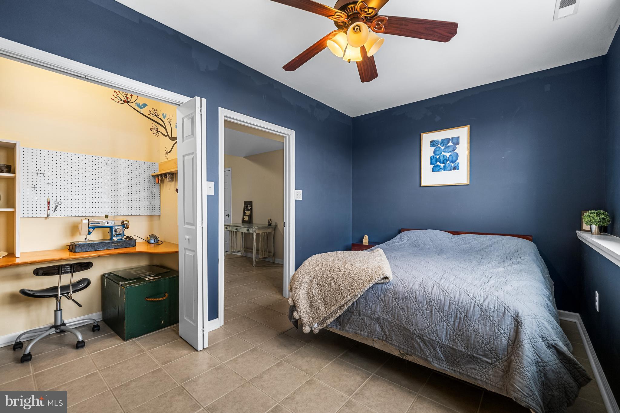 12270 High Point Road Felton, PA 17322 - Photo 30 of 45 a bedroom with a bed and a chandelier