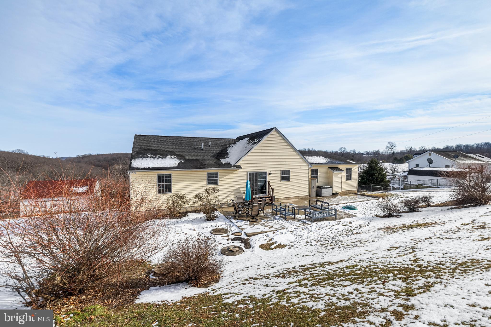 12270 High Point Road Felton, PA 17322 - Photo 39 of 45 a view of a house with a snow in the background