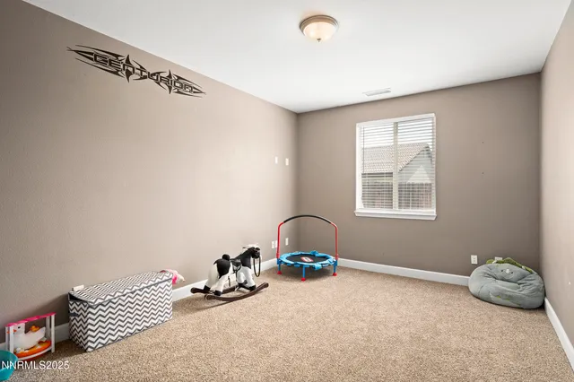 a room with a bed and a window