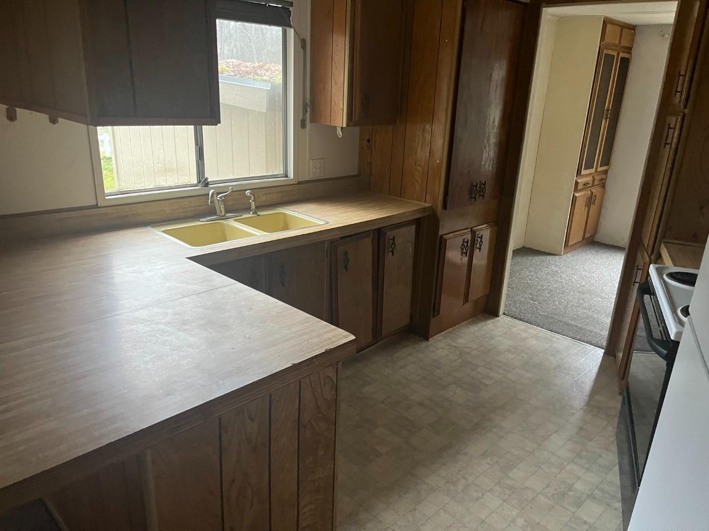 Undisclosed Address Central Point, OR 97502 - Photo 6 of 16 a view of a kitchen with a sink and a window