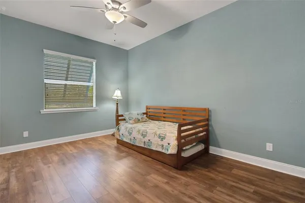 a room with a bed and a window