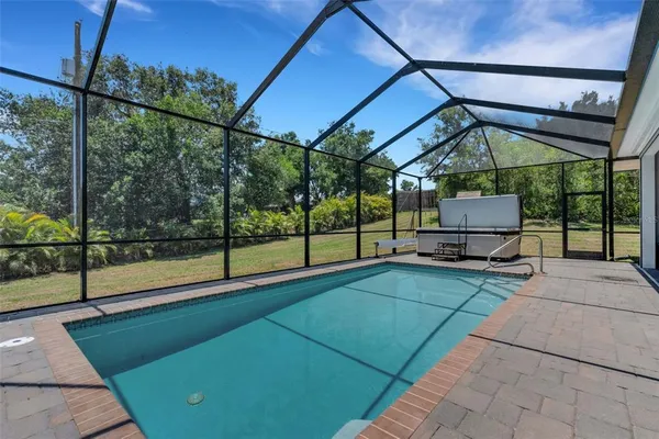 a view of backyard with green space