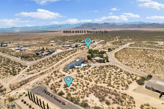 an aerial view of ocean and with trees