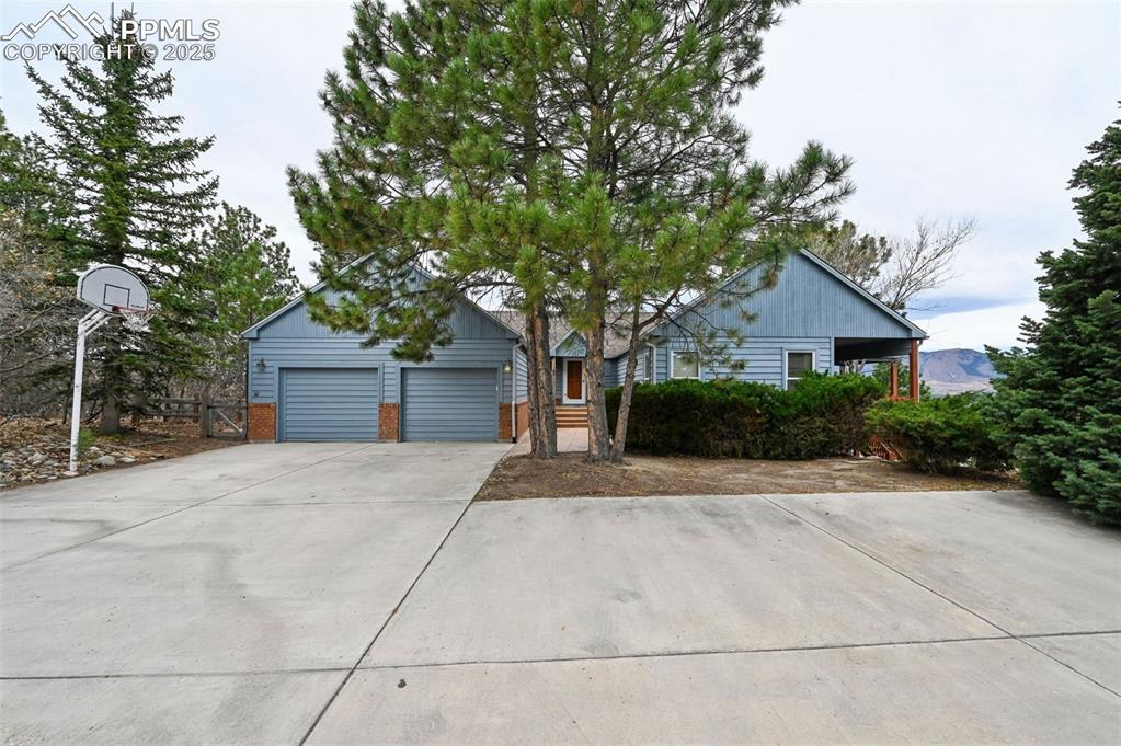 17580 Chipped Arrow Way Monument, CO 80132 - Photo 3 of 50 a house view with a outdoor space