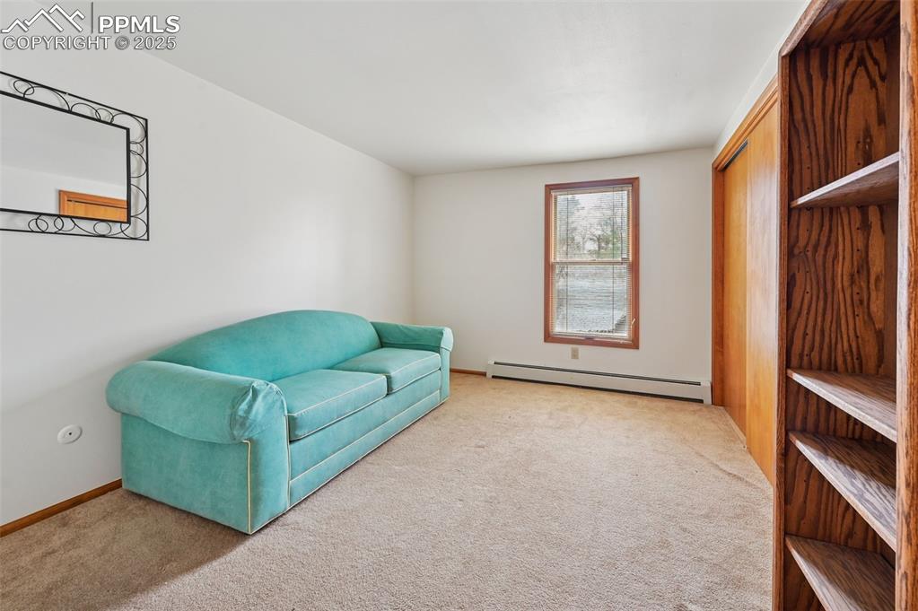 17580 Chipped Arrow Way Monument, CO 80132 - Photo 42 of 50 a living room with furniture and a window