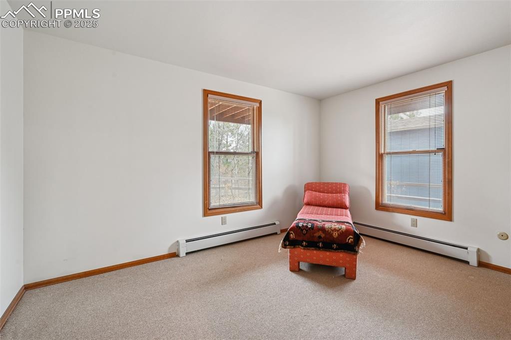 17580 Chipped Arrow Way Monument, CO 80132 - Photo 46 of 50 an empty room with windows