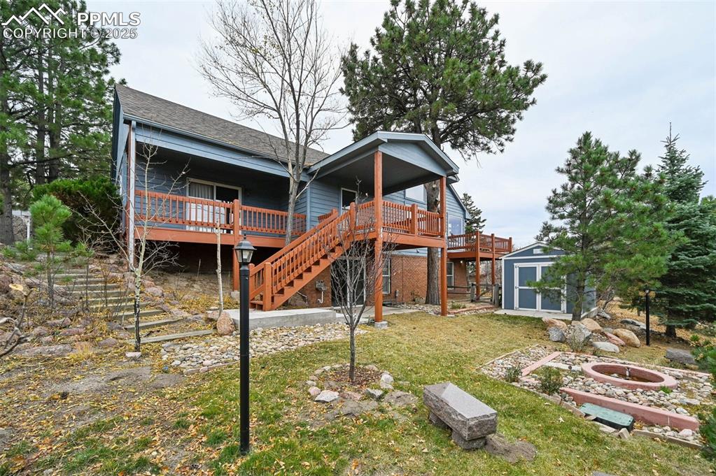 17580 Chipped Arrow Way Monument, CO 80132 - Photo 6 of 50 a house with trees in front of it