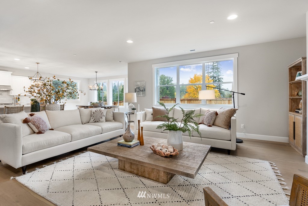 19037 85th ( 4) Avenue Bothell, WA 98011 - Photo 11 of 30 a living room with furniture and a large window