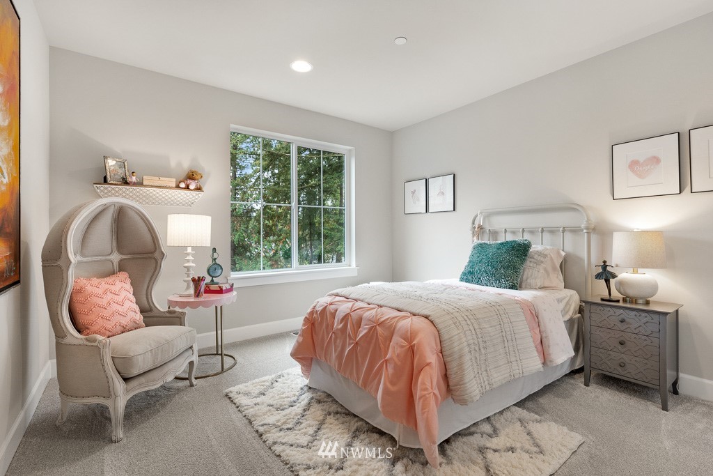 19037 85th ( 4) Avenue Bothell, WA 98011 - Photo 19 of 30 a bedroom with a bed and a couch