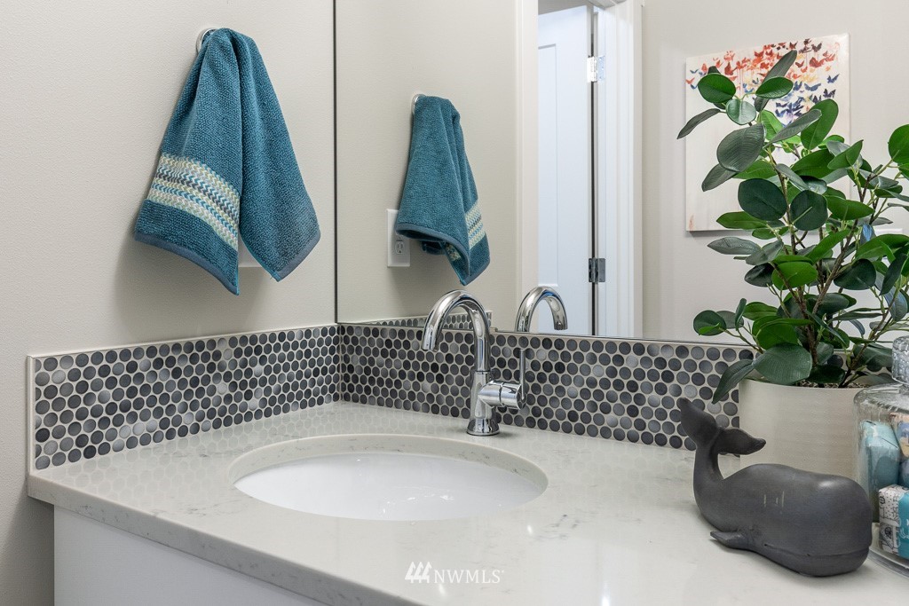 19037 85th ( 4) Avenue Bothell, WA 98011 - Photo 25 of 30 a bathroom with a bathtub and a sink