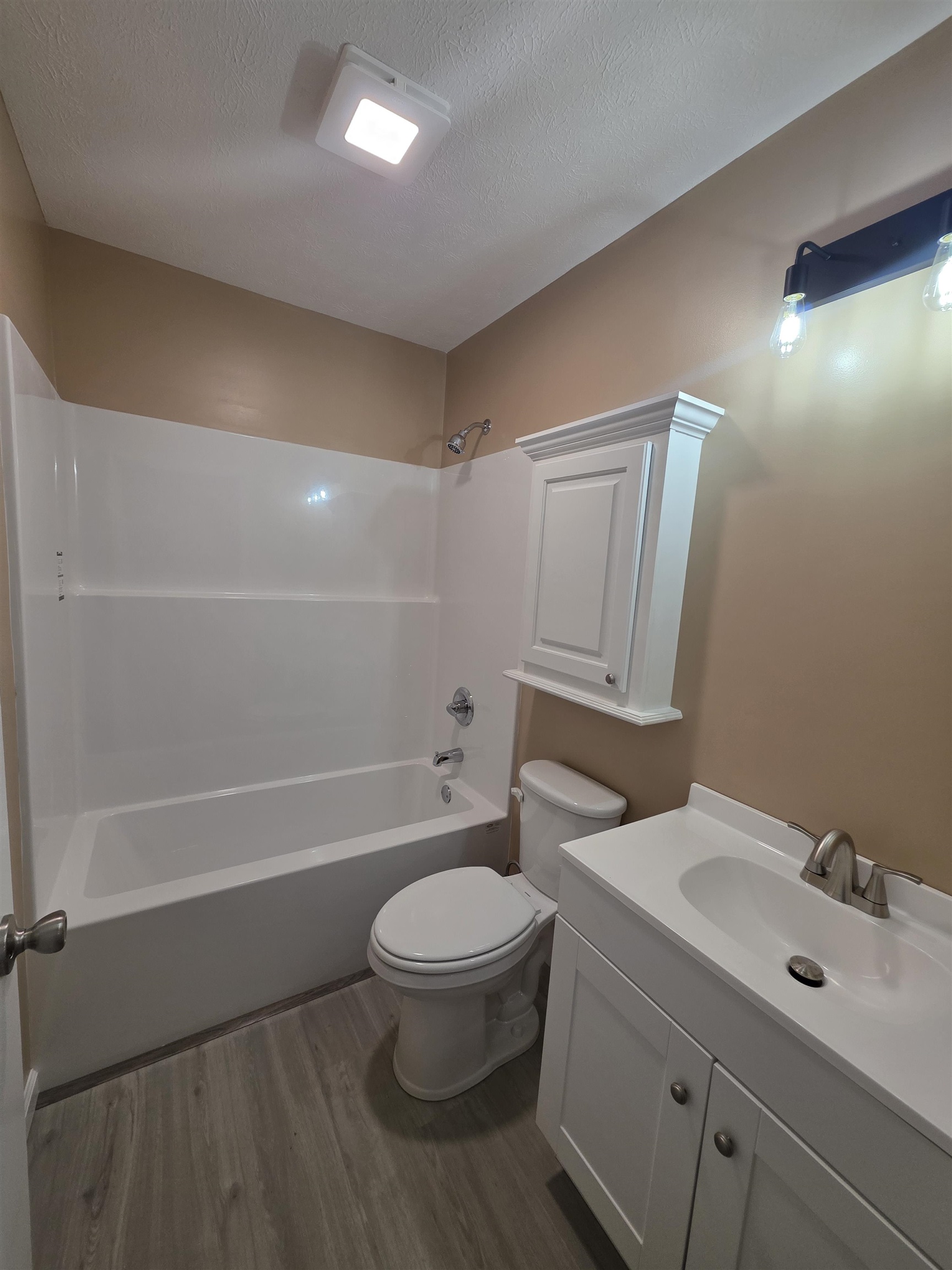 1020 Jade Road Savannah, TN 38372 - Photo 9 of 16 a bathroom with a sink a toilet and shower