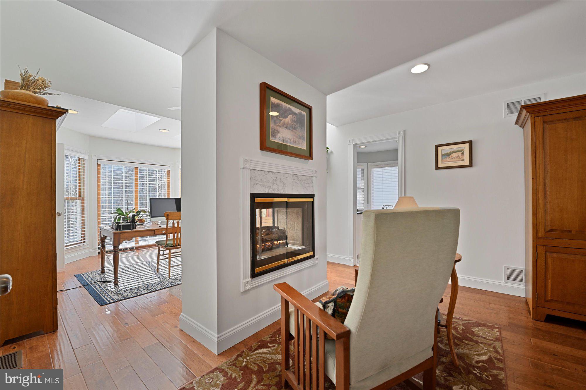 1631 Concordia Drive Pasadena, MD 21122 - Photo 21 of 53 Primary bedroom fireplace & sitting area