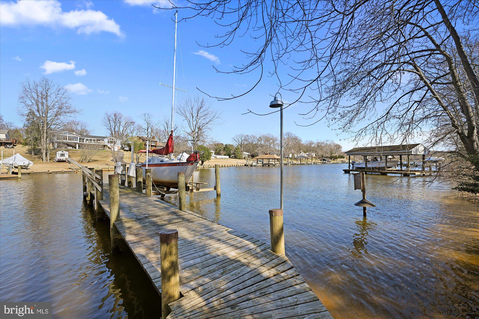 1631 Concordia Drive Pasadena, MD 21122 - Photo 38 of 53 Dock with water & electric