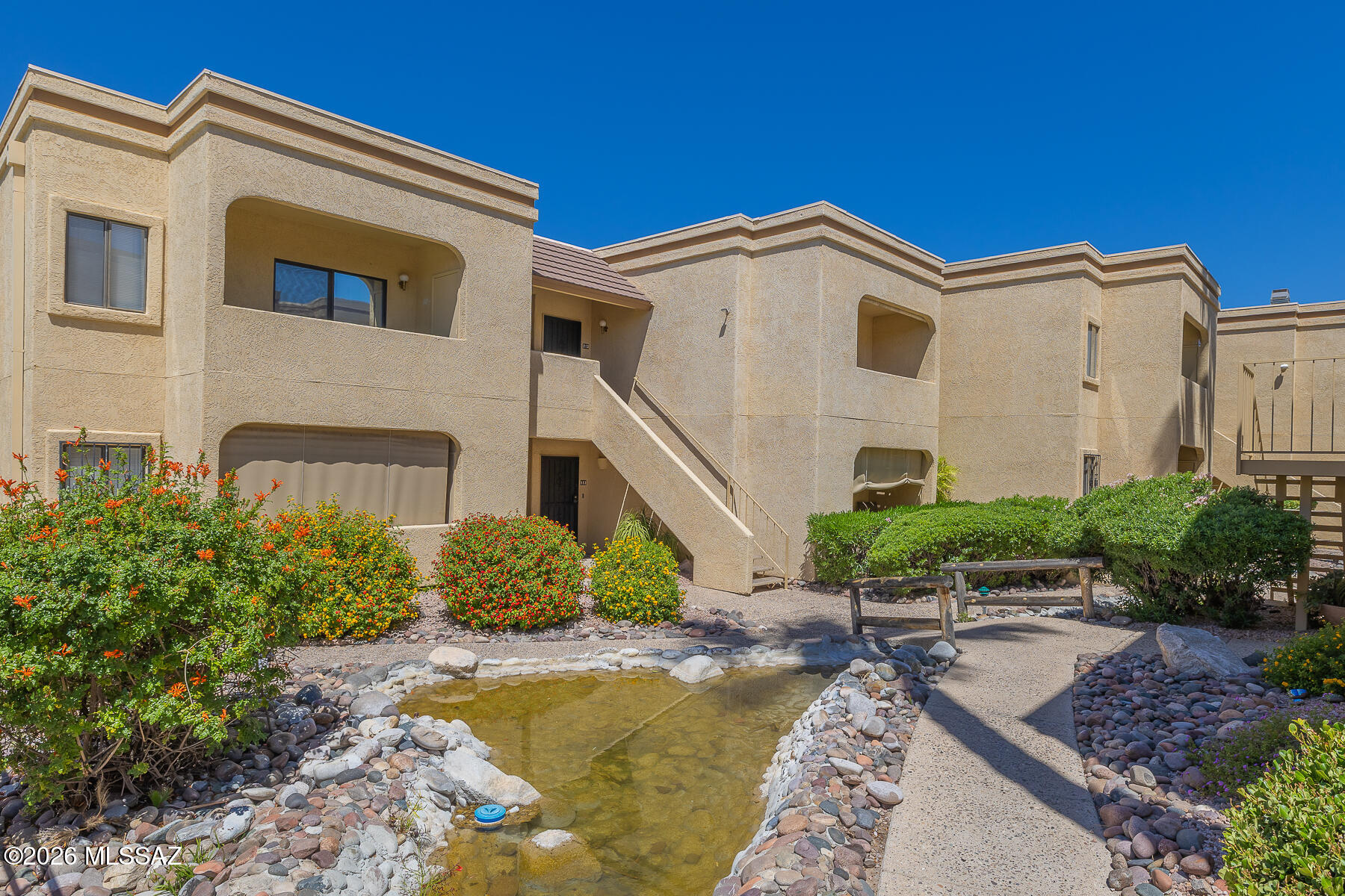 5500 North Valley View Road, Unit 213 Tucson, AZ 85718 - Photo 27 of 32 Sidewalk to #213