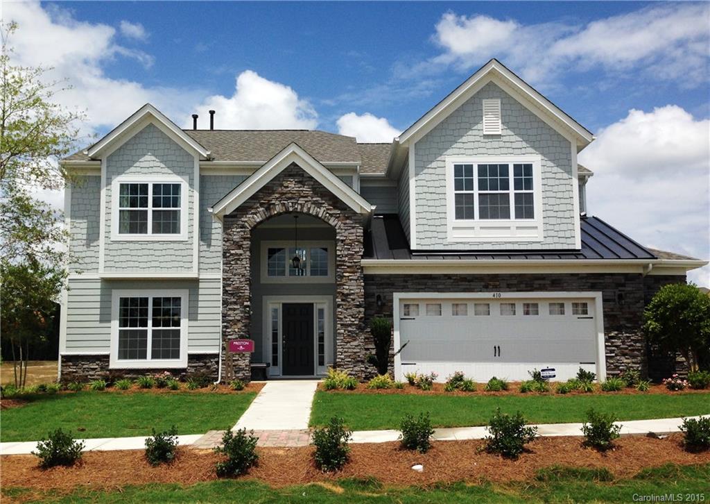 574 Brookhaven Drive, Unit HKC90 Fort Mill, SC 29708 - Photo 1 of 7 a front view of a house with a yard and garage