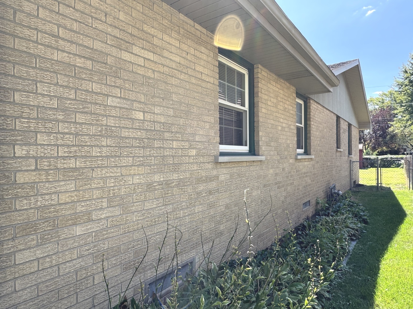 1442 West Budd Boulevard Kankakee, IL 60901 - Photo 26 of 27 a view of a brick wall and a window