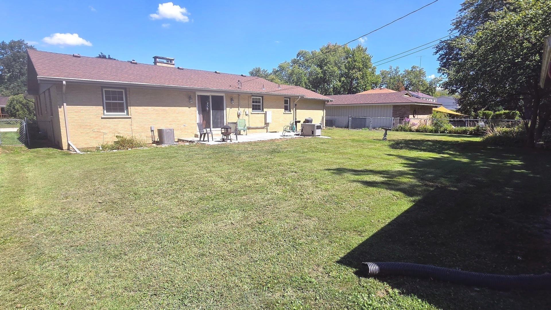 1442 West Budd Boulevard Kankakee, IL 60901 - Photo 27 of 27 a front view of a house with garden