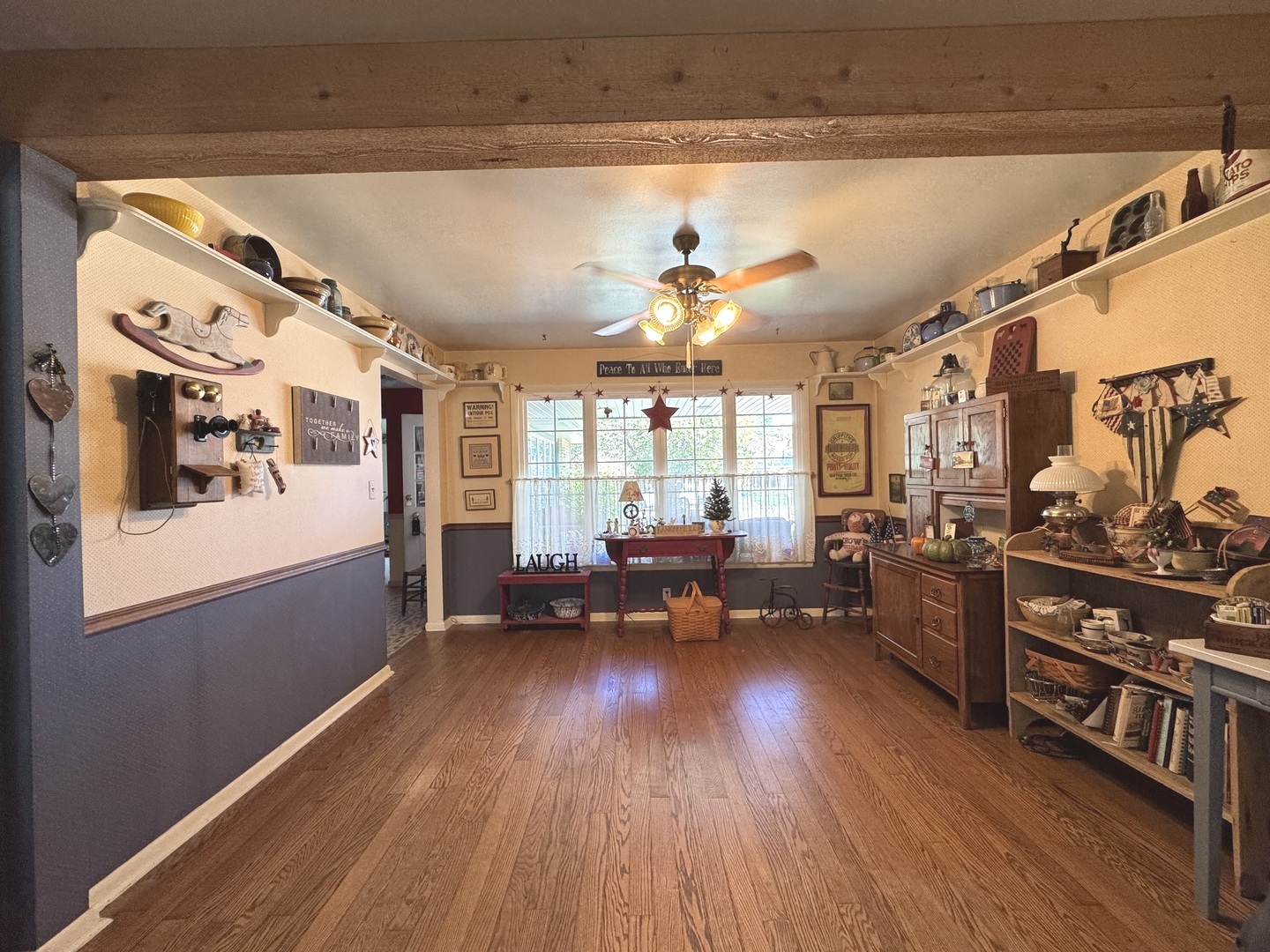 1442 West Budd Boulevard Kankakee, IL 60901 - Photo 8 of 27 a living room with lots of furniture and a wooden floor