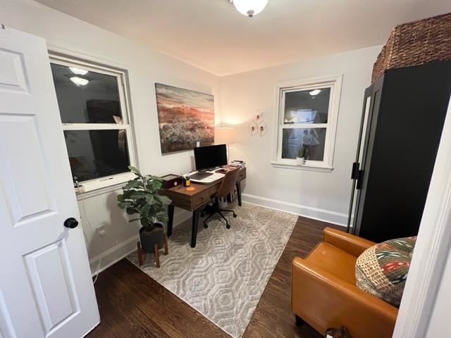 128 69th Street, Unit 1 Guttenberg, NJ 07093 - Photo 11 of 14 a living room with furniture and a flat screen tv