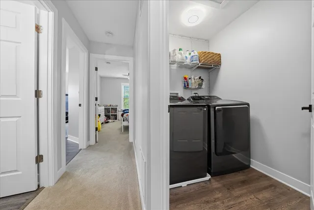 a view of hallway with livingroom