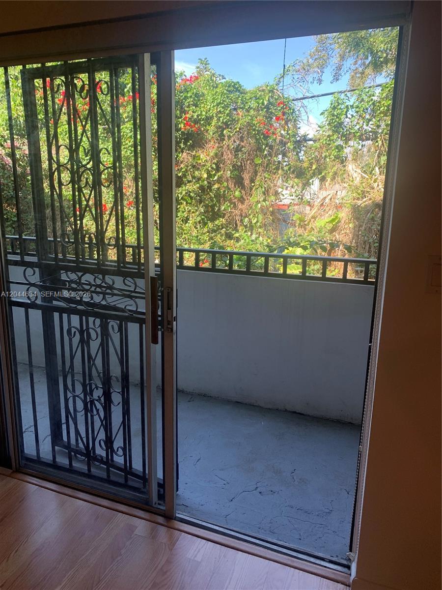 2460 Southwest 18th Avenue, Unit 1205 Miami, FL 33133 - Photo 7 of 21 a view of a balcony with an outdoor space