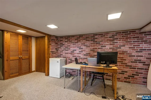 a livingroom with furniture and a fireplace