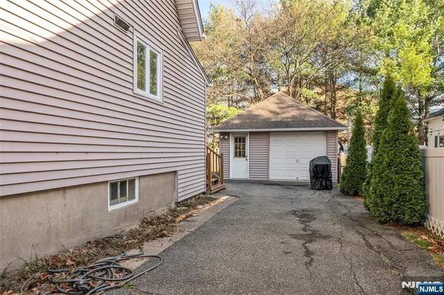 a front view of a house with a garage