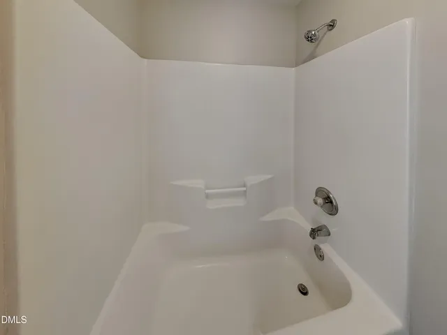a close up of a bathtub
