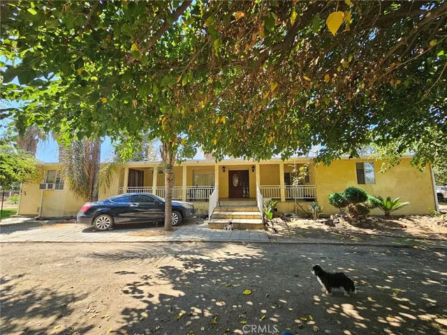 a car parked in front of a house
