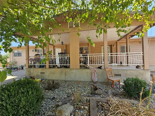 a house with trees in front of it