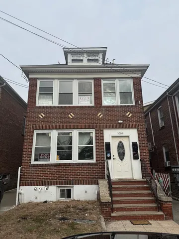 a front view of a house with a balcony