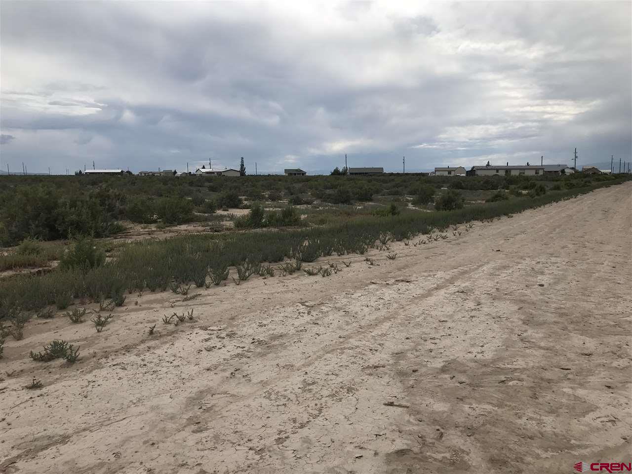 Undisclosed Address Alamosa, CO 81101 - Photo 5 of 19 View from Mountain View Blvd toward neighbor.