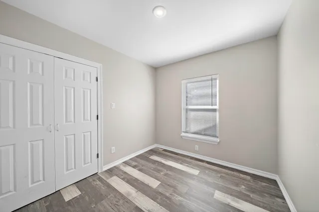 an empty room with windows