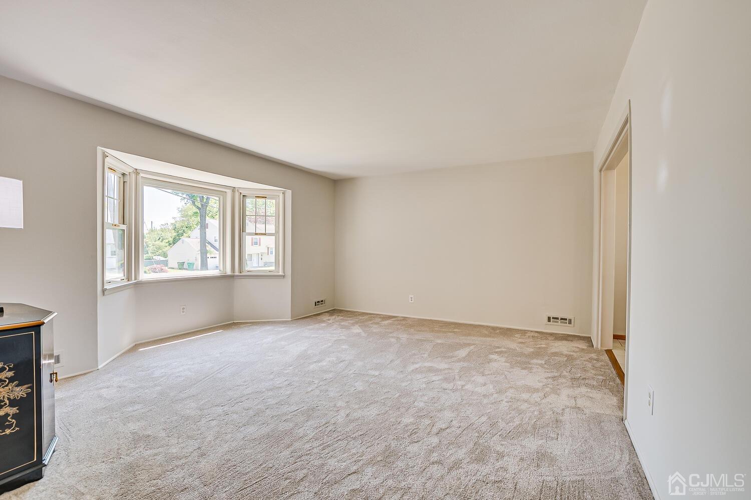 8 Meyer Road Edison, NJ 08817 - Photo 13 of 47 an empty room with windows