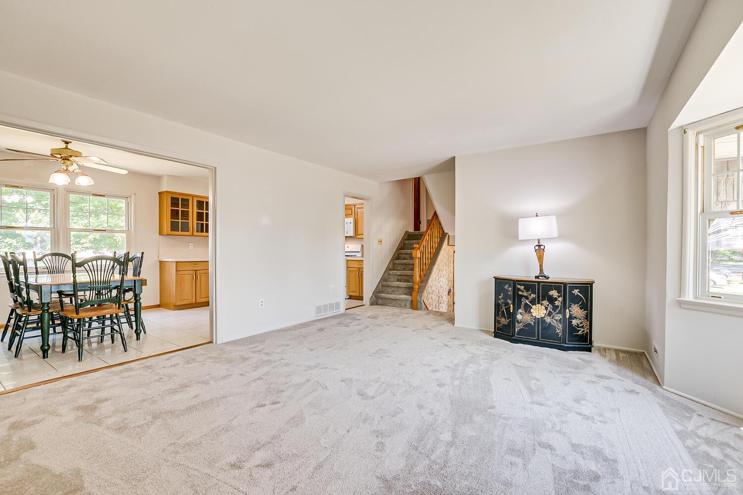 8 Meyer Road Edison, NJ 08817 - Photo 15 of 47 a view of a livingroom with furniture and a window