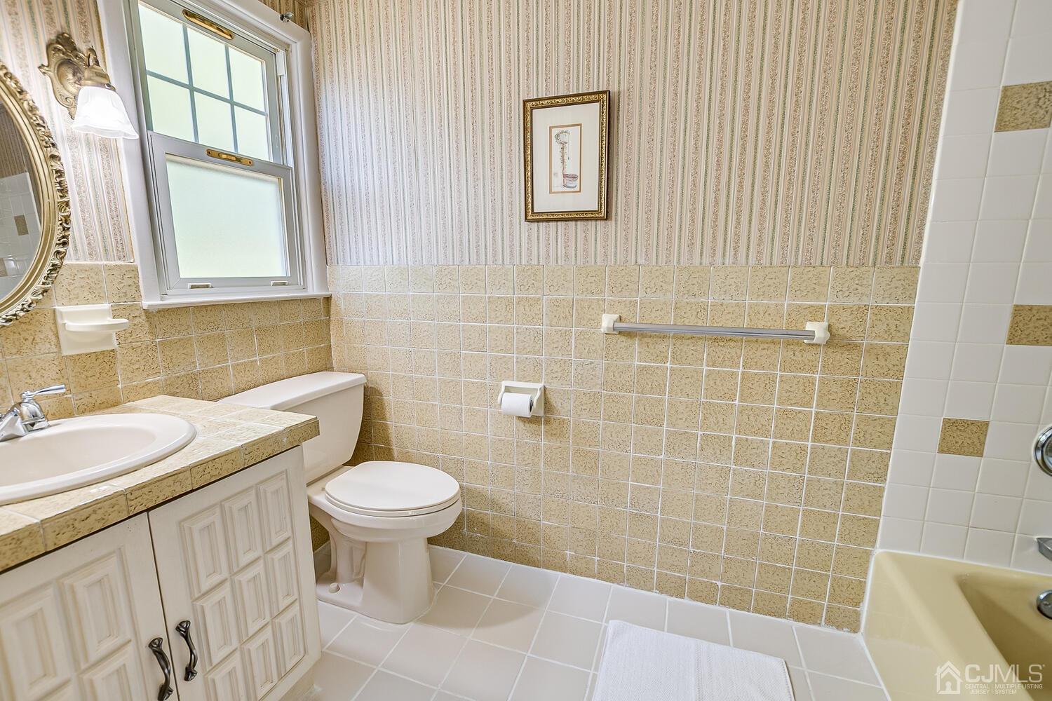 8 Meyer Road Edison, NJ 08817 - Photo 30 of 47 a bathroom with a toilet sink and a bathtub