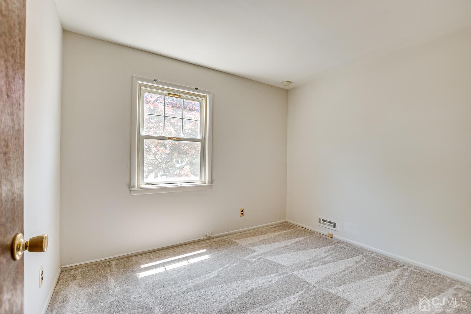 8 Meyer Road Edison, NJ 08817 - Photo 34 of 47 a view of a room with a window