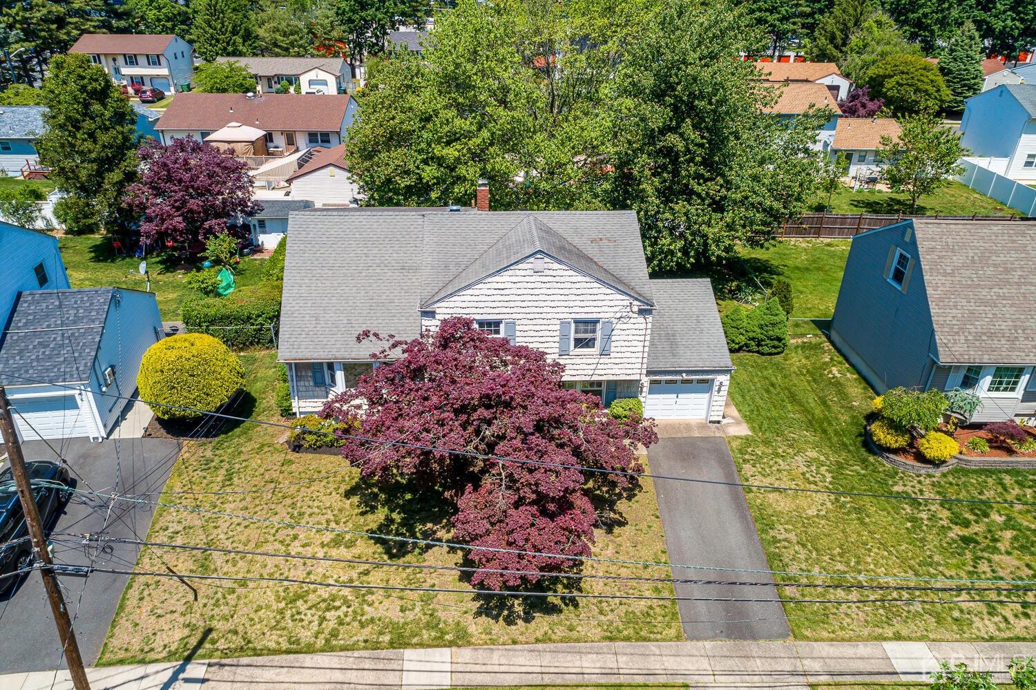 8 Meyer Road Edison, NJ 08817 - Photo 45 of 47 a view of backyard with plants and outdoor seating