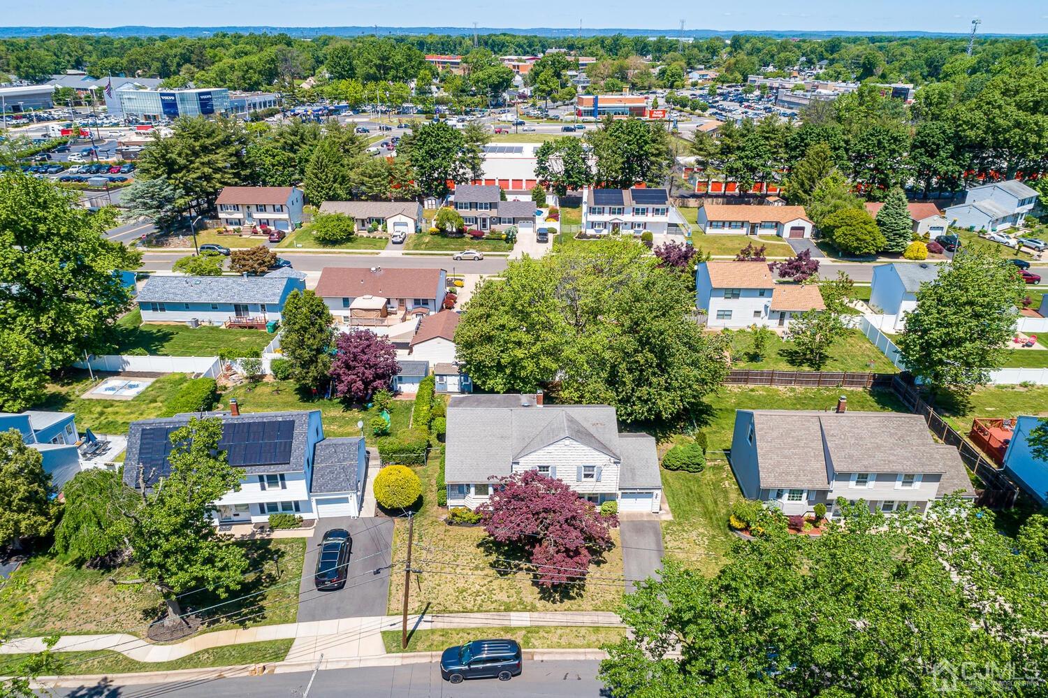 8 Meyer Road Edison, NJ 08817 - Photo 46 of 47 an aerial view of residential houses with outdoor space and parking