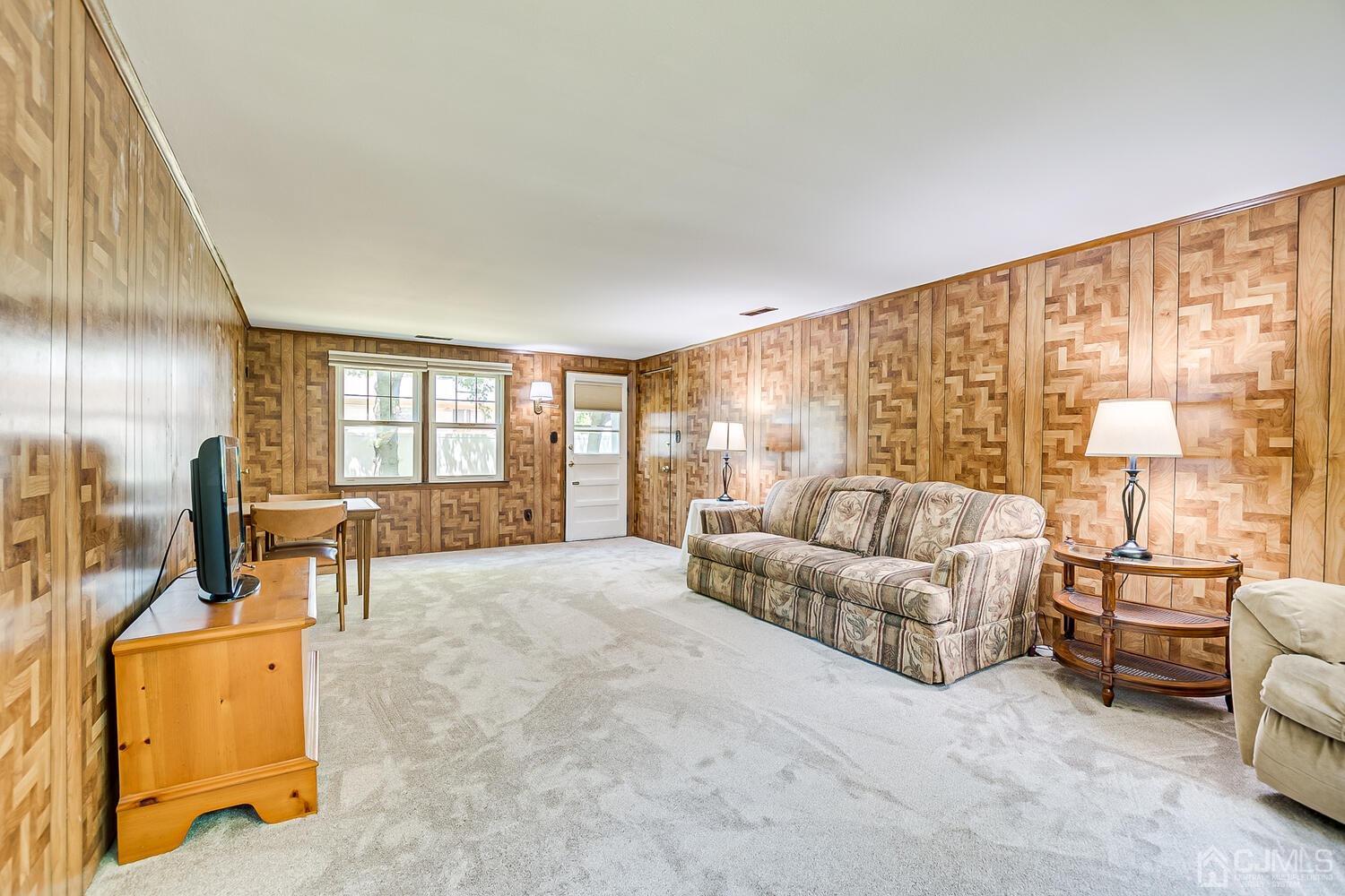 8 Meyer Road Edison, NJ 08817 - Photo 6 of 47 a living room with furniture and a large window