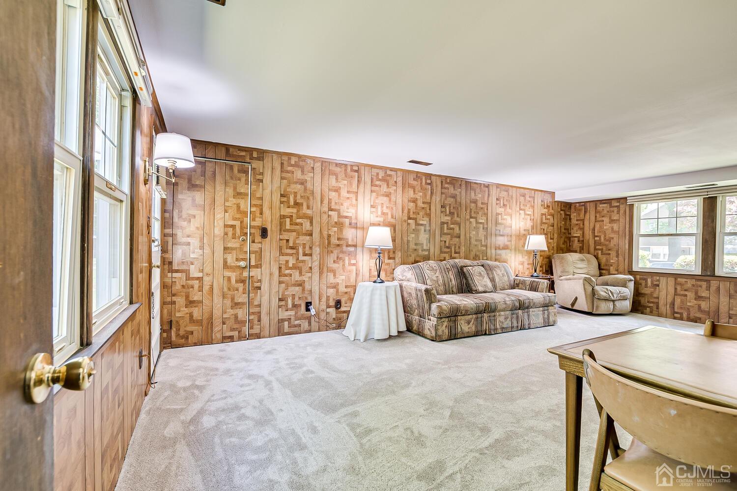 8 Meyer Road Edison, NJ 08817 - Photo 10 of 47 a spacious bedroom with a large bed and a couch