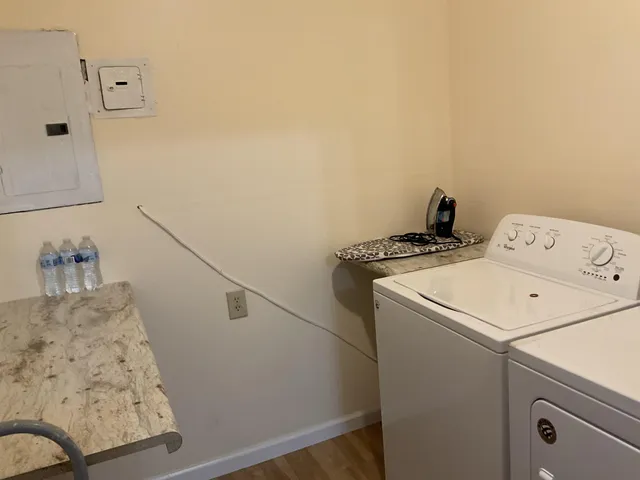 a utility room with dryer and washer