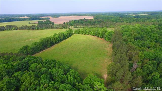 0 Macedonia Church Road, Unit 3 Monroe, NC 28112 - Photo 4 of 9 a view of a lake with a big yard
