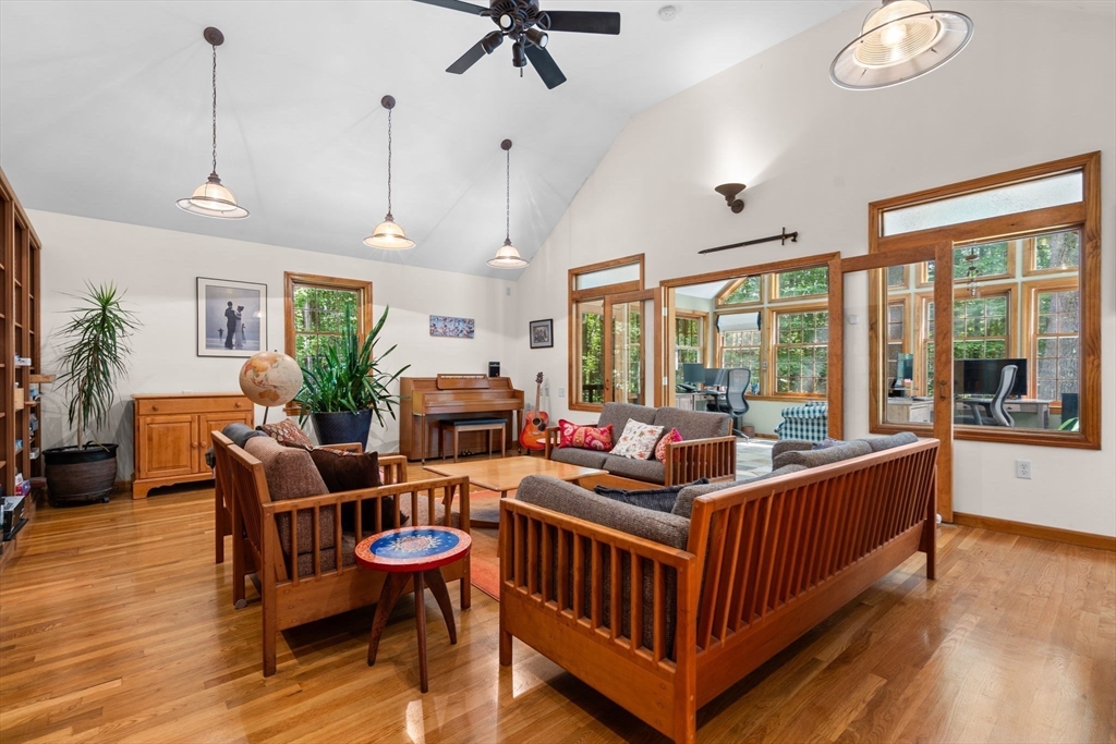 9 Stagecoach Road Princeton, MA 01541 - Photo 14 of 42 a living room with furniture a table and a large window