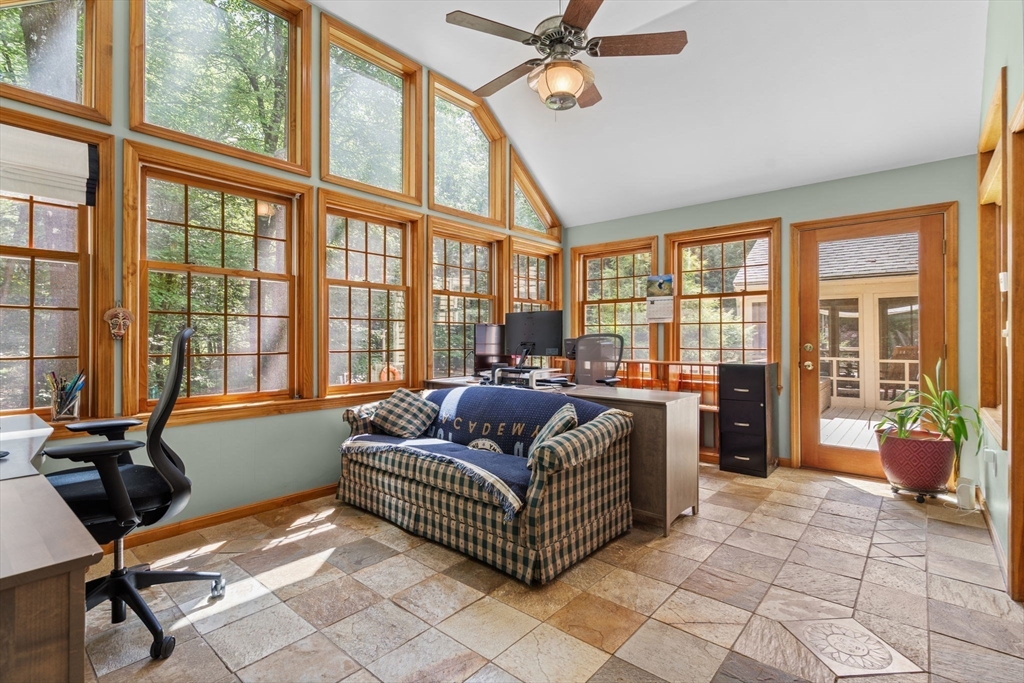 9 Stagecoach Road Princeton, MA 01541 - Photo 16 of 42 a living room with furniture and floor to ceiling windows