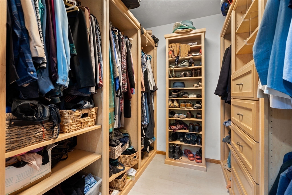 9 Stagecoach Road Princeton, MA 01541 - Photo 24 of 42 a view of walk in closet with clothes and shoes
