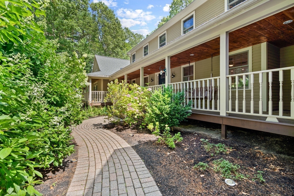 9 Stagecoach Road Princeton, MA 01541 - Photo 3 of 42 a front view of a house with garden
