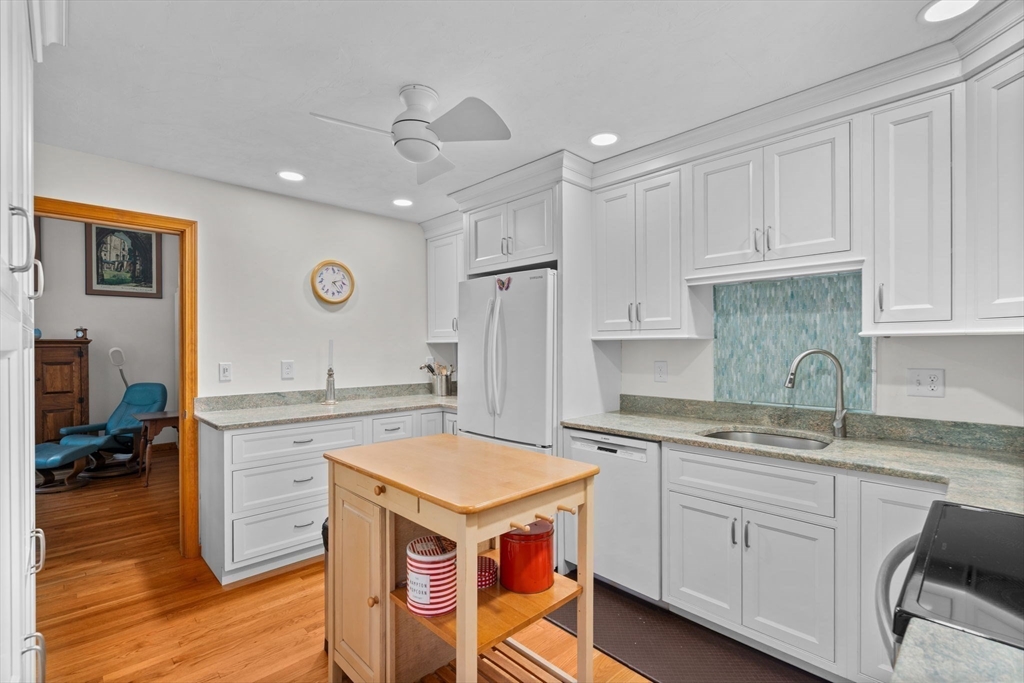 9 Stagecoach Road Princeton, MA 01541 - Photo 34 of 42 a kitchen with a sink stove and cabinets