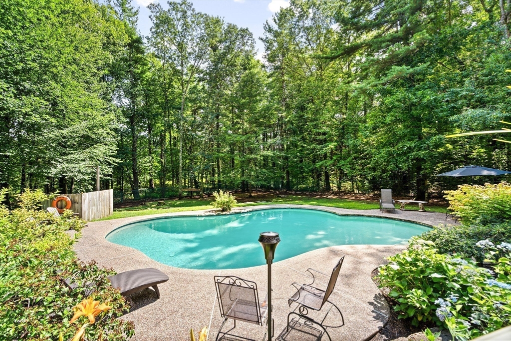 9 Stagecoach Road Princeton, MA 01541 - Photo 39 of 42 a view of a swimming pool with a yard
